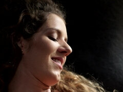 A curly babe that loves to fool around is naked and alone today