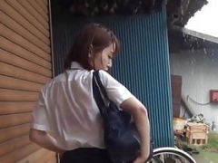 Japanese schoolgirl soaks her panties up at a rainy day