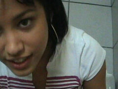 Busty latina teen Anna sucks cock in toilet POV