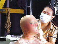 Female domination Latex Breathplay by Domina Fire