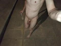 Naked in public, playing with my piss whipping my ass
