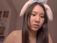 Cute Asian girl Alize Zaide in bunny costume enjoys ASMR vibes