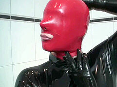 crimson + Black Latex Catsuit Girl And High Heel torment - Rubber bitch Heeljob