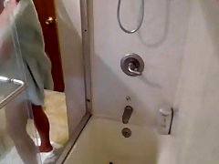 Milf showers and plays on cam