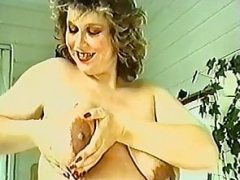 A pregnant female licks her milk