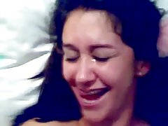 Brazilian chick laughing while getting facial