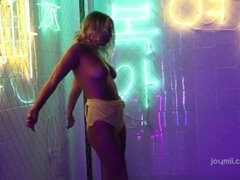 Femjoy - Darina seduces with smooth strip tease under neon lights