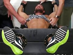 Naked man is bound for intense tickling