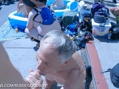 Exhibitionist dad enjoys public piss play and raw pounding at Folsom Street Fair