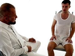 Skinny teen is taking off his clothes and gets jerked off