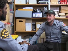 Tattooed hunk riding officers massive black dick