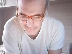 I jerk my hard cock, piss twice in the empty bottle and read a book.