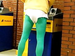 White Hotpants and green pantyhose in public office.