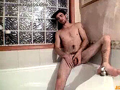 Duke loves wanking his meaty unshaved boner in the full bathtub