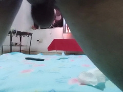 Muscle man pummels his cushion