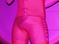 Cute twink strips off her tight cycling suit and shows off her big ass and her big cock