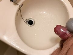 Small Penis With A Vibrator Sleeve Cumming And Pissing On Sink