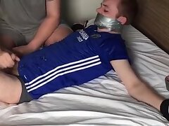 twinkboy tied on the bed brutally jerked off
