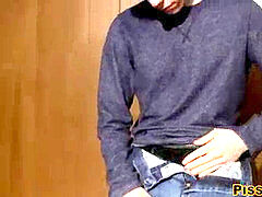 young fellow pees and pours it on himself before masturbating