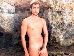 Lucca is all alone at the beach and he plays with his cock