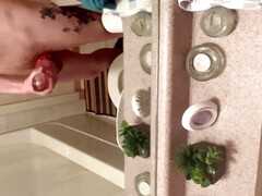 Stroking in bathroom and cumshot