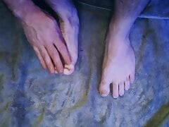 Massaging my feet with my cum