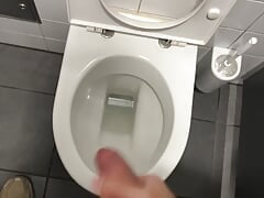Jerking at the Airport Restroom