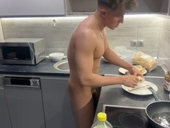 Muscular gay hunk showcases his cooking skills while enjoying a monster cock!
