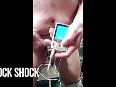 Cock shock with tens unit and chastity device. On my Dick