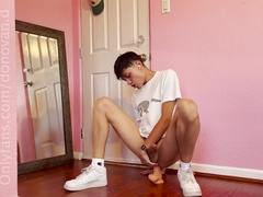 Stiff railing dressed in sneakers