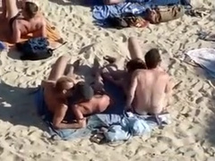 4 Guys Playing On Nude Beach