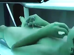 Tanning booth wank