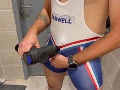 Athletic guy masturbating in his tight wrestling singlet bodysuit
