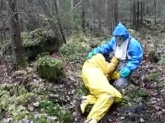 Raingear puppy with a friend outdoors