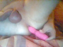 lying in bed and playing with a dildo in my ass and playing with my cock
