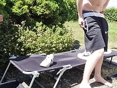 Young Nike Boy has fun outdoors and squirts