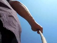 Crossdresser walking with butt plug in the forest 2