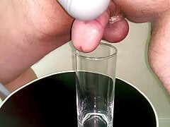 Small Penis Masturbating With A Hand Massager And Cumming In A Glass