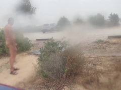 nude in the storm in a cruising parking bunch