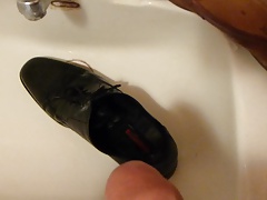 Piss in men's dress shoe