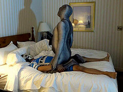 Cycle suit, zentai, hand over mouth