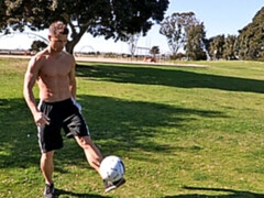 Chiseled hottie stroking his meaty cock while on camera