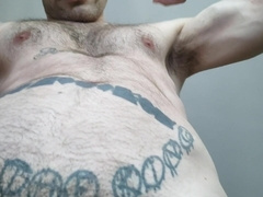 Displaying furry torso and uncircumcised lollipop