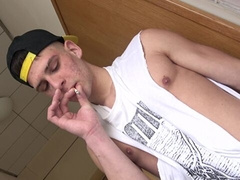 Flavio Conroy smokes a cigarette and enjoys a handjob too