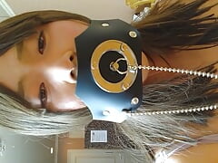 A cross-dressing boy masturbates in his underwear with a stoppered gag