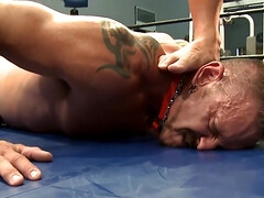 Nude men fuck in the ring after a rough bondage play