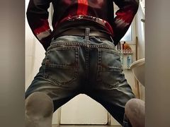 Jeans boy striptease in public toilet
