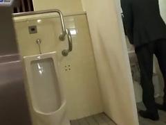 Asian hides in the bathroom to jerk off while wearing a suit
