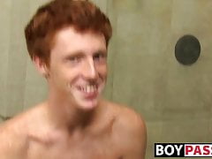 Redhead twink Alan Parish masturbates and cums under shower