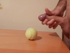 Handjob and cumshot on tennis ball